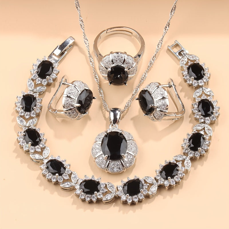 Elevate your look with this stunning 5-piece jewelry set for women. Each piece is beautifully silvery plated and accented with sparkling cubic zirconia for a touch of elegance. This set includes a dainty necklace, earrings, ring, and bracelet, making it