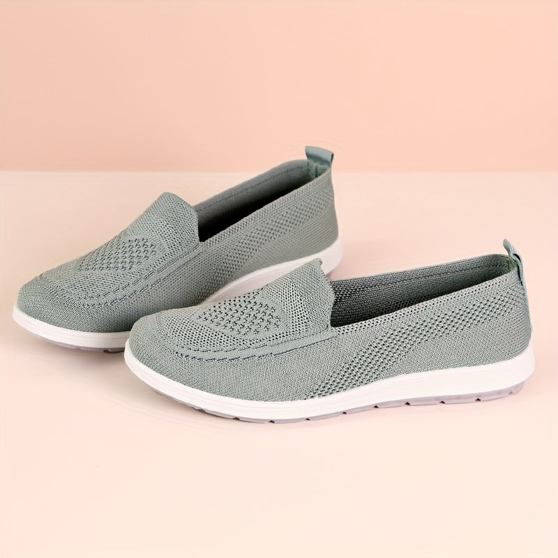 Women's slip-on flats with comfortable fabric upper, flax insole, and faux sole for easy daily wear.