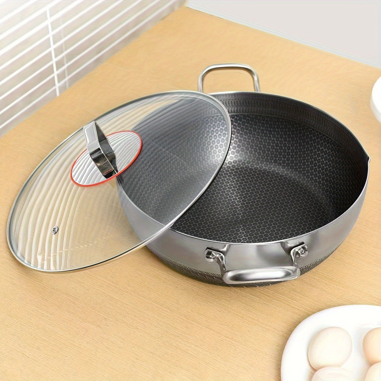 Stainless steel multi-purpose pot with lid, suitable for various stoves, including frying pan, cooking pot, soup pot, hot pot, and fry pan, all in one.