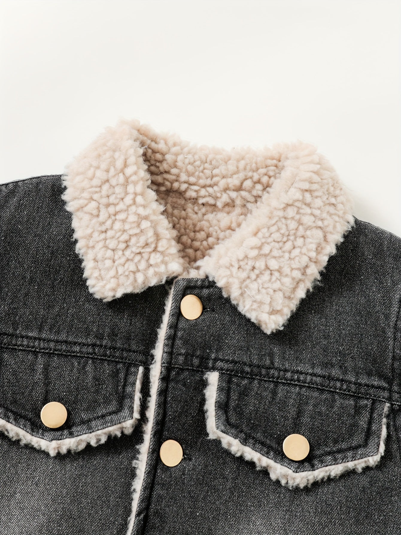 Warm, casual denim jacket lined with cozy fleece for boys in Fall/Winter.