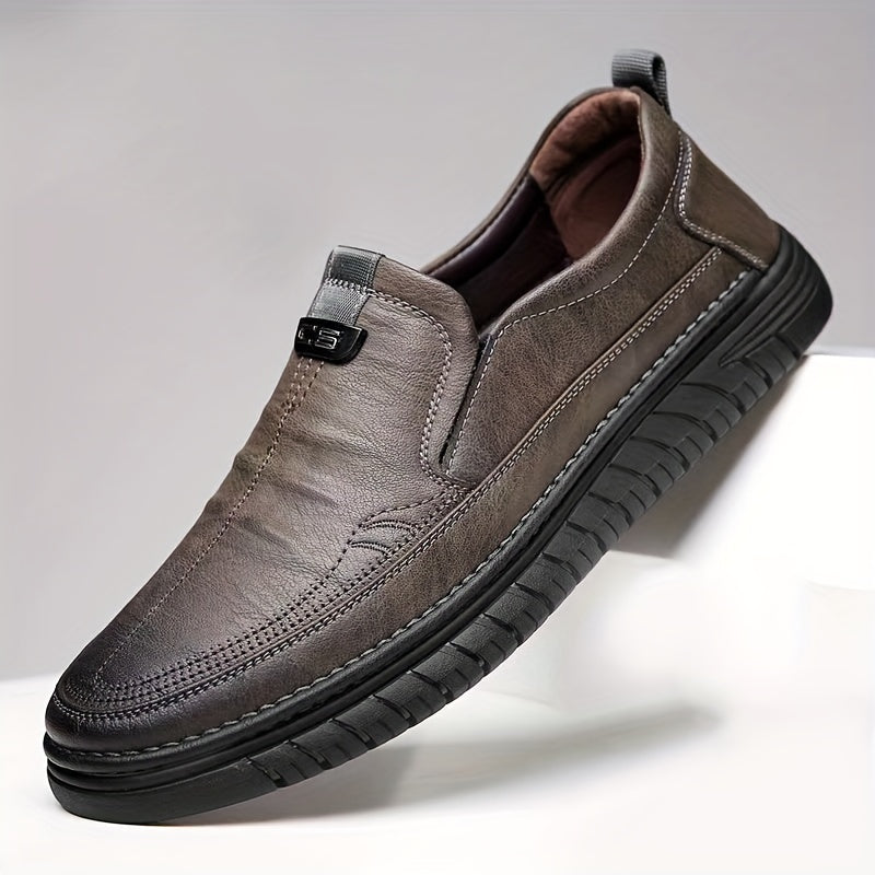 Men's brown slip-on loafers with soft, non-slip rubber sole for everyday comfort and style.