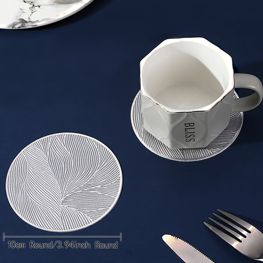 6 PVC round place mats with leaf pattern, heat resistant and non-slip. Hand wash only. Perfect for dining, weddings, and holiday decor.