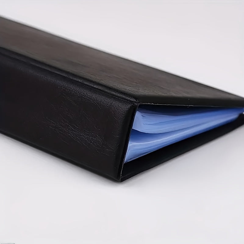 Professional black and white business card holder made of durable PVC material with multiple slots for cards.