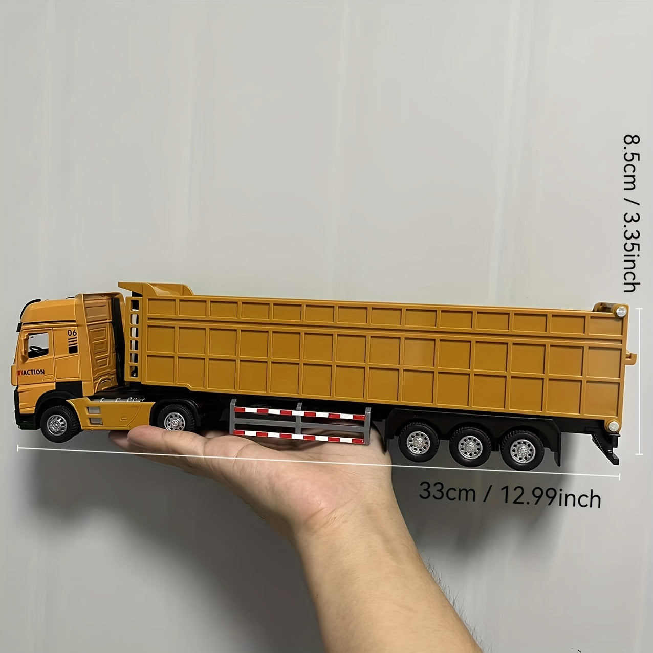 Large yellow alloy construction truck toy for boys, ideal for winter