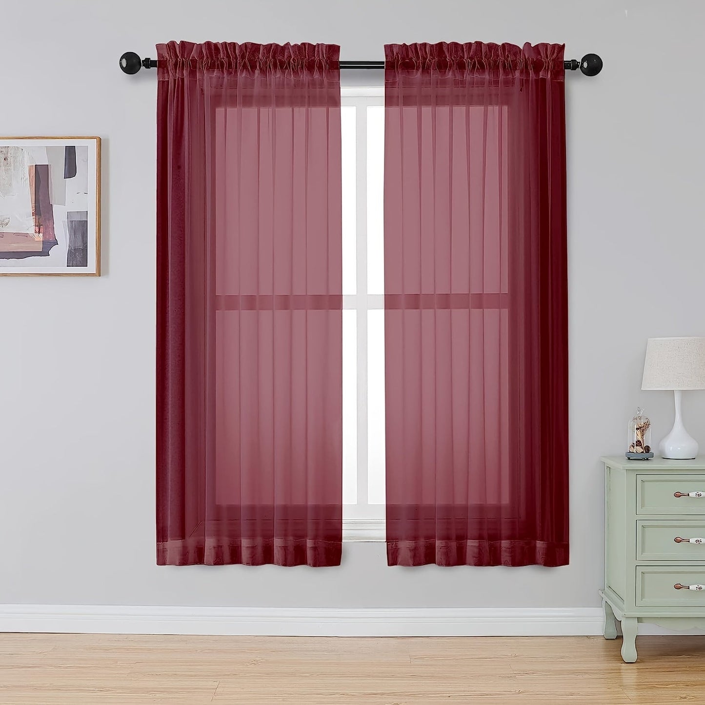 Two panels of sheer curtains with a basic rod pocket design, perfect for adding a touch of elegance to your bedroom, office, living room, yard, kitchen, or any other space in your home.