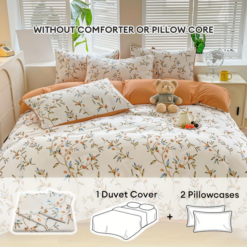 Orange flower and fruit plant pattern quilt cover set includes 1 quilt cover and 2 pillowcases in a pastoral style. Made from comfortable and skin-friendly material, it is non-ball and can be machine washed. Available in single, double, standard, and