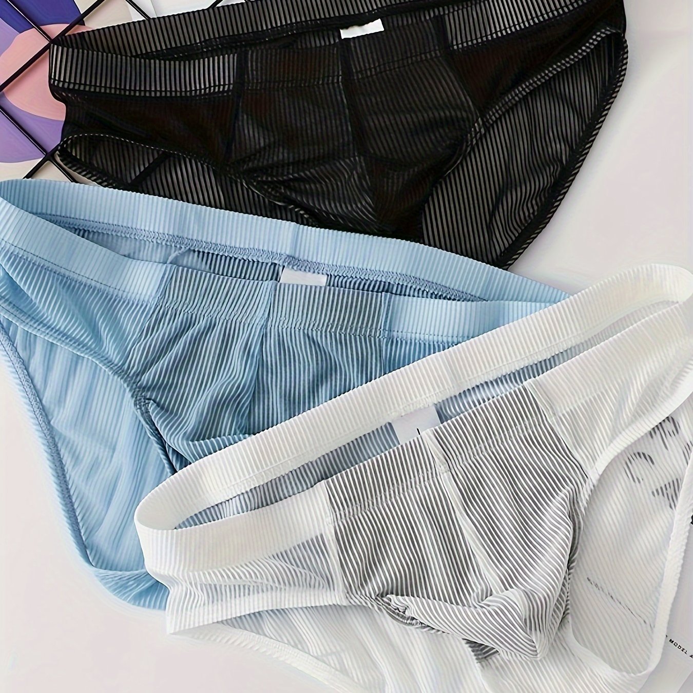 3 Men's Ice Silky Cool Briefs with Big Pouch Design in Black, Light Blue & White, Machine Washable.