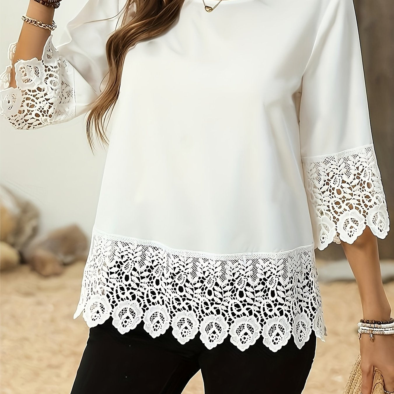 Elegant white plus size blouse for women made of polyester. Features round neck and half sleeves, ideal for spring and summer wear.