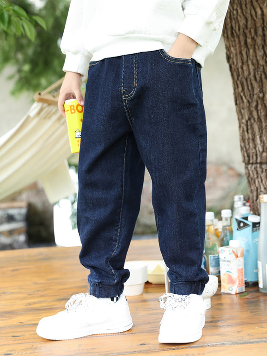 High-waisted denim jogger pants for boys with elastic waistband and cuffed ankles