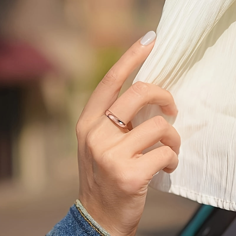 Basic rose gold tungsten steel rings in 4mm width suitable for both women and men. Perfect for minimalist engagement or wedding. Available in sizes 4-13.