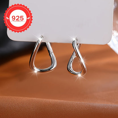 These stunning S925 sterling silver square geometric hoop earrings are designed with a minimalist and irregular style, perfect for both everyday wear and special occasions. They make the perfect gift, exuding a sense of light luxury that is suitable for