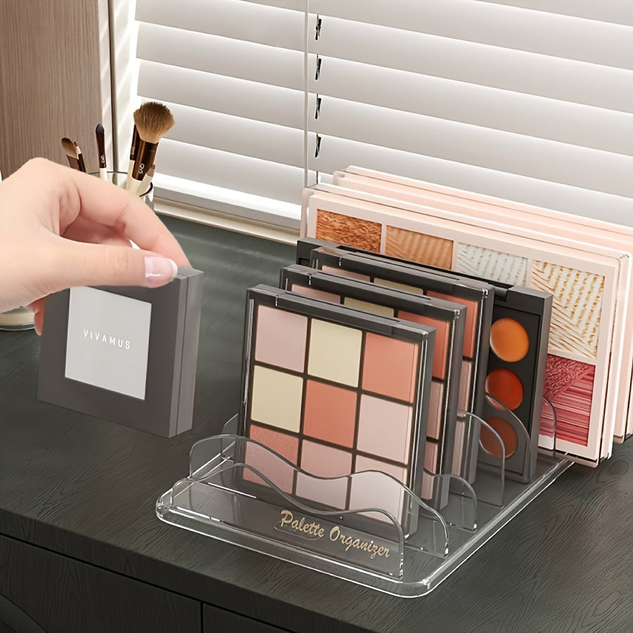 Plastic makeup palette organizer with wave divider, countertop storage rack for cosmetics. Compact and lightweight, under 68.58 cm tall. Stores multiple makeup palettes.