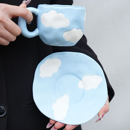 Cloud-shaped ceramic coffee mug with saucer - reusable, handwash only, ideal for breakfast & office use - great gift idea.