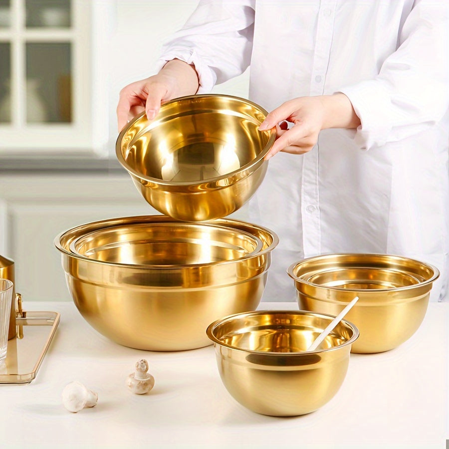 Stainless steel mixing bowl set in gold with lids in white, black, and khaki. Ideal for Christmas serving, baking, preparation, cooking, and serving food. Nested design saves space, dishwasher safe. Available in various sizes from 500ml to 4000ml.