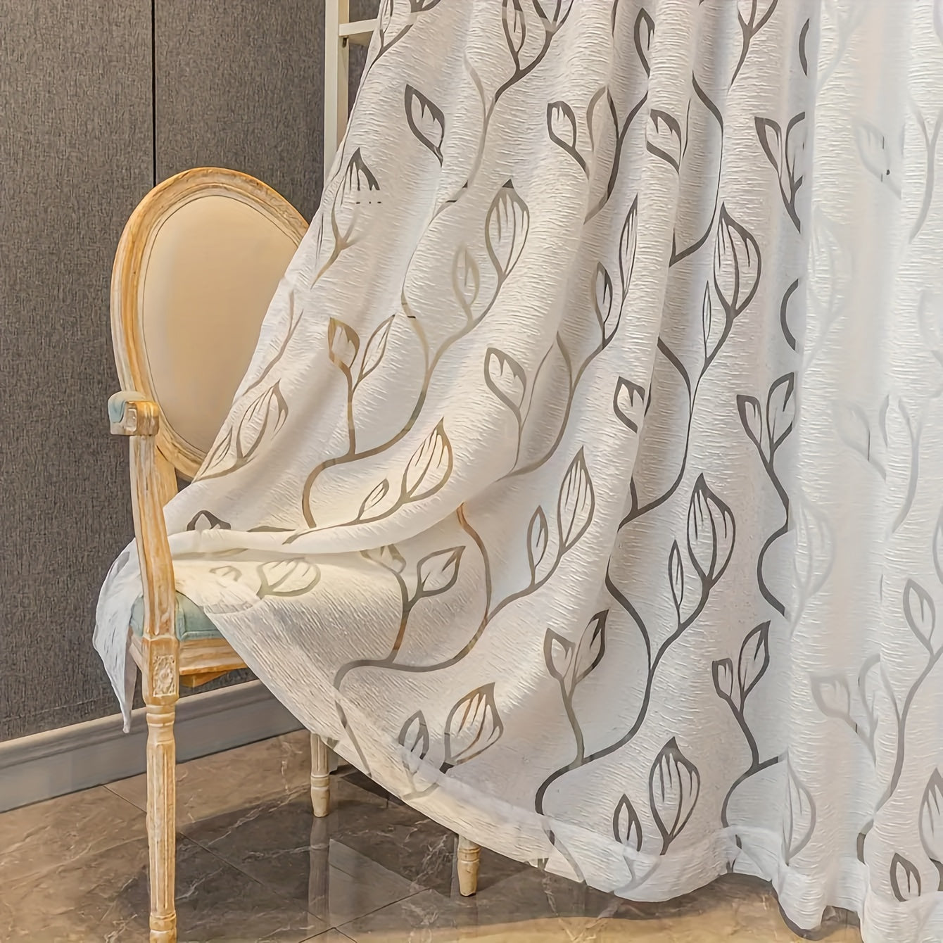 Add a touch of Nordic minimalism to your space with this elegant white sheer curtain featuring a beautiful hollow leaf design. Made with bark texture fabric, this curtain has a rod pocket top for easy hanging. Perfect for bedrooms, living rooms, and