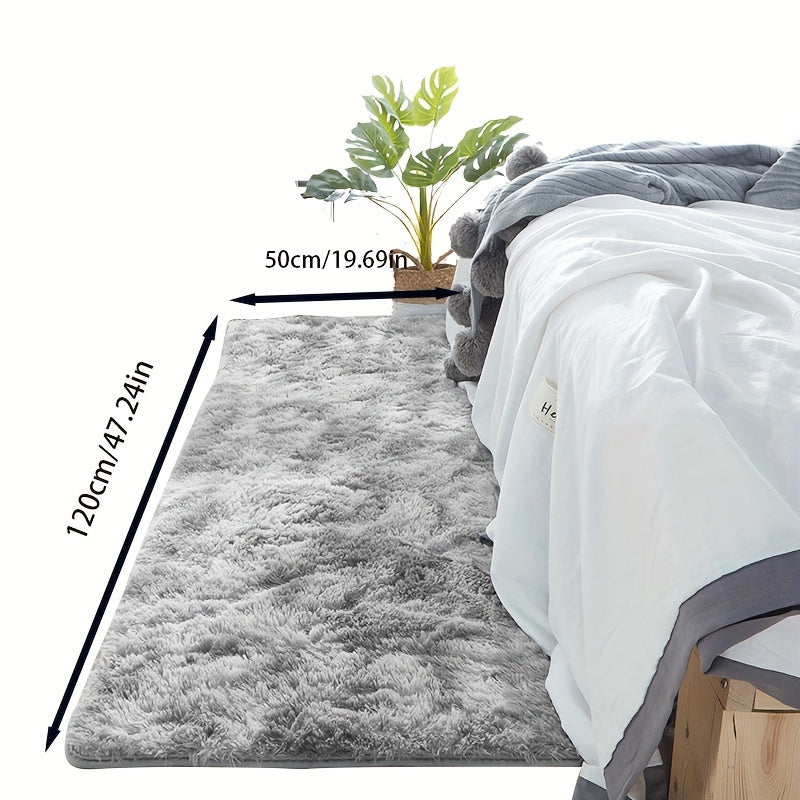 One piece of plush, fluffy area rug designed for bedrooms. This soft, fuzzy shaggy rug is black in color and rectangular in shape, perfect for adding warmth to your living room. It features a non-slip bottom to ensure safety. Great for Halloween or