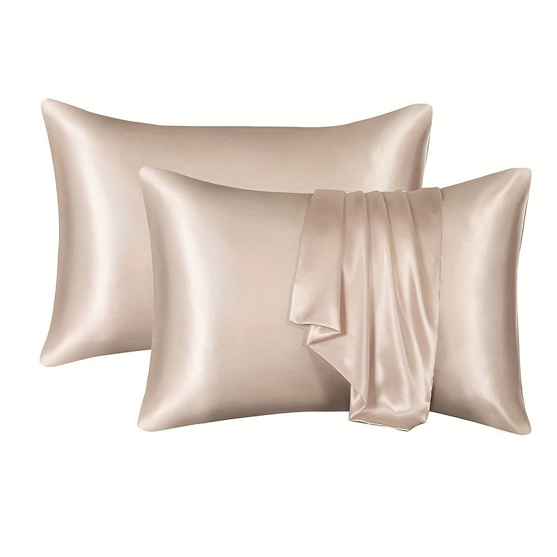 A set of two luxurious sateen pillowcases, each weighing 90g and featuring an envelope closure. Crafted from 100% polyester satin and silky fabric, these pillowcases are designed to be gentle on both hair and skin. They come in a variety of colors to