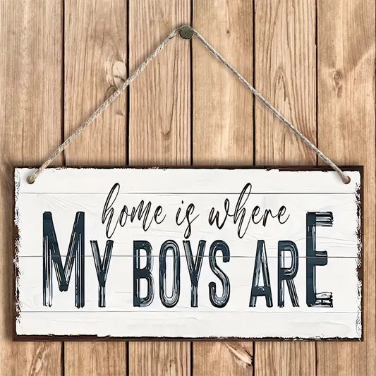 Wooden sign with the words "Home Is Where My Boys Are," a delightful gift idea for a new mom or Mother's Day. This farmhouse-style wall decor is perfect for the bedroom and adds a touch of shabby chic charm. It's a wonderful keepsake and a lovely