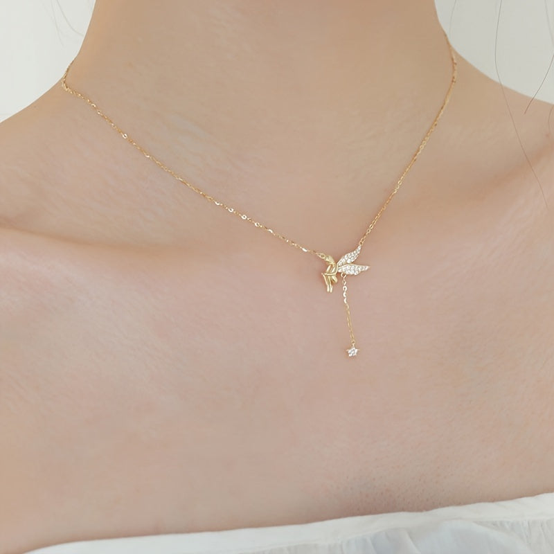 Sterling silver necklace with elf design, featuring a tassel and star pendant. This fashionable and minimalist clavicle chain is perfect for women who appreciate elegant French style. Inspired by celestial symbols, this piece adds a touch of charm to any