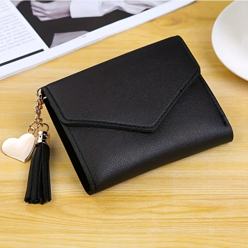 Compact trifold wallet for women with faux clutch coin purse, minimalist credit card holder, stylish tassel charm, and versatile for daily use.