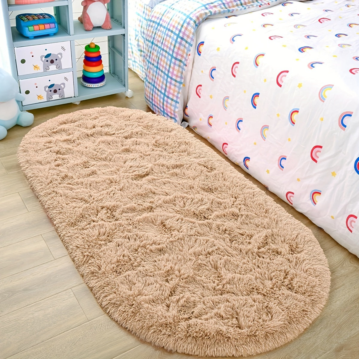 Soft and fluffy oval shaggy area rug, perfect for bedroom or living room. Made with skin-friendly thickened sponge and tufted polyester material. Durable and easy to maintain. Adds decorative touch to indoor spaces such as sofa, bedside, playroom, or