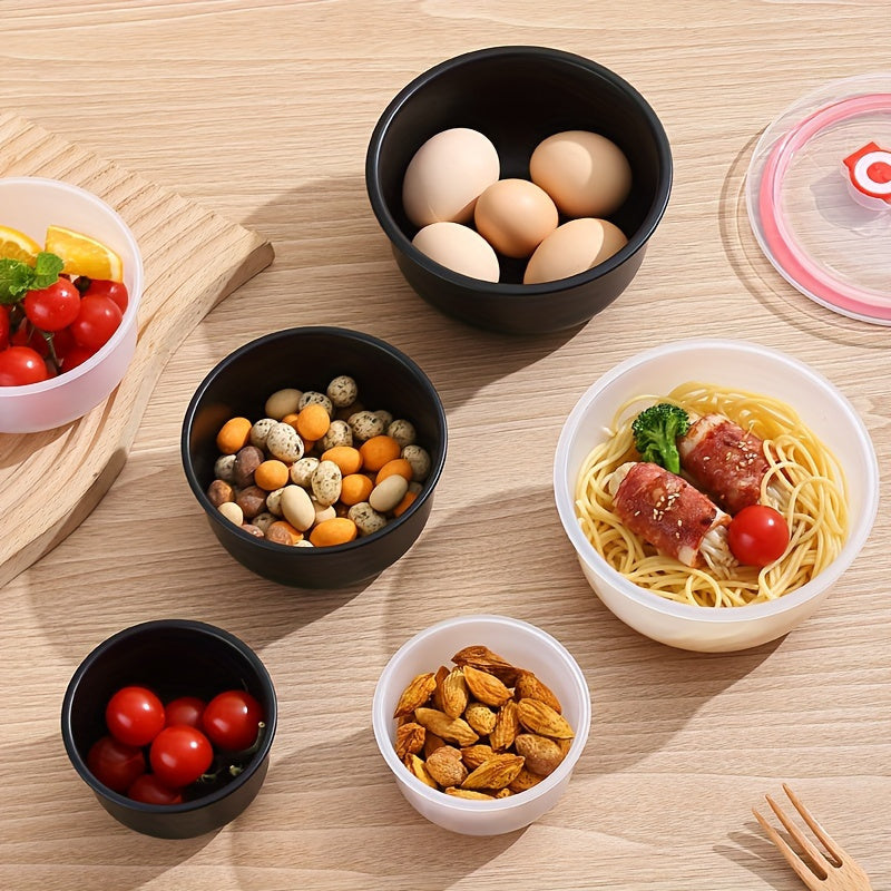 Set of 3 round plastic storage containers with leak-proof, reusable, multipurpose flip-top lids for kitchen organization. Made of wheat straw material, these fresh-keeping bowls are perfect for storing grains, fruits, vegetables, and meals. Easy to hand