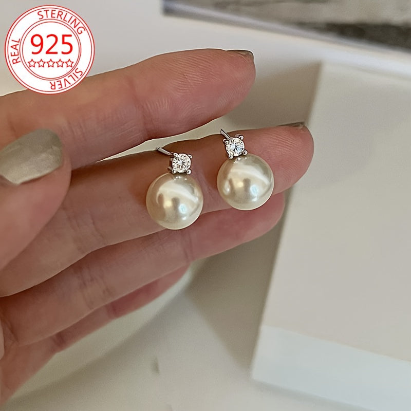 Add a touch of elegance with these stunning 925 Sterling Silver Stud Earrings featuring Sparkling Moissanite and Freshwater Imitation Pearl. This Hypoallergenic Luxury Vintage Style Jewelry is perfect for women, ideal for gifting and special occasions.