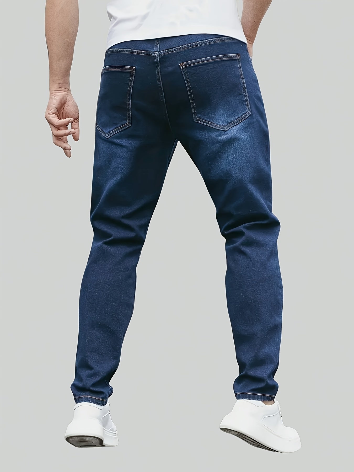 Men's denim jeans in plus size with a straight leg cut, made of 65% cotton, 33.7% polyester, and 1.3% spandex. Features medium stretch, all-season comfort, solid washed style, and 370gsm