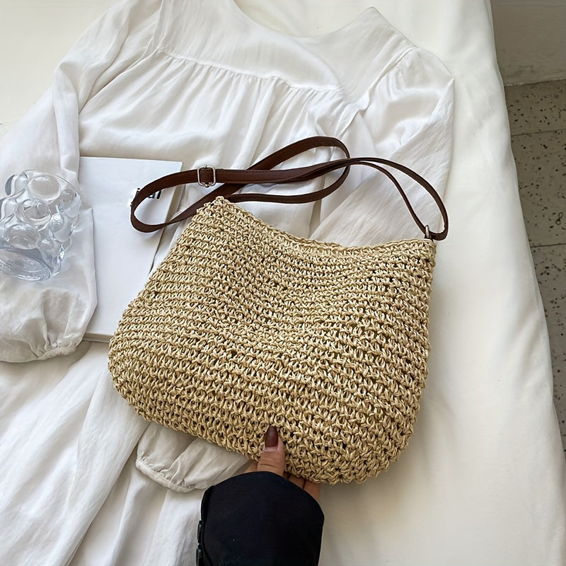 Handmade rattan crossbody bag for women, woven straw shoulder bag for summer.