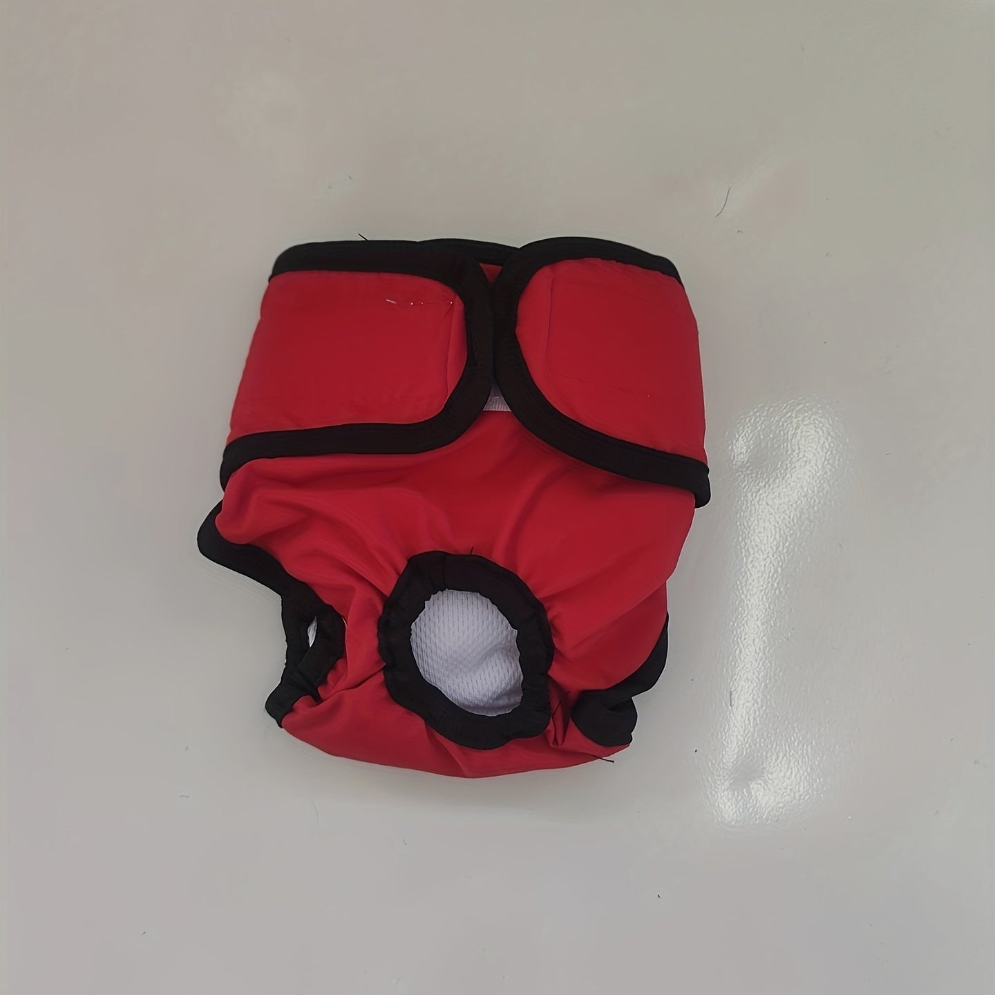 Washable physiological pants for dogs and cats with adjustable absorbency.