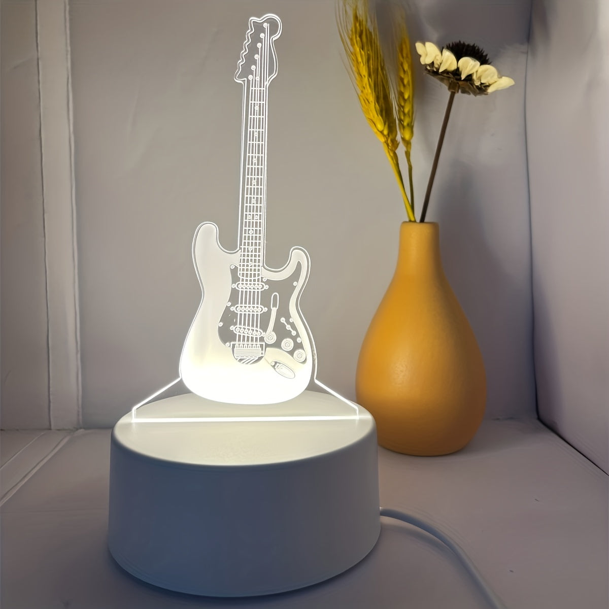 3D Guitar night light with warm white base, perfect gift for friends or room decoration.