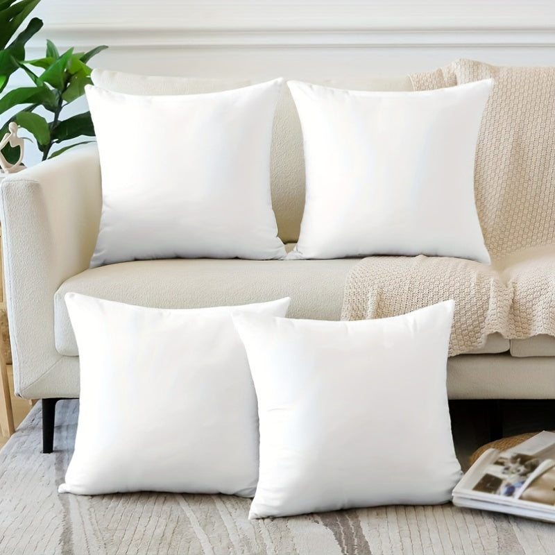 Pack of 4 machine-washable white pillow covers in solid polyester, zippered for easy use. Suitable for various room styles. Decorative sofa cushion covers, no insert included.