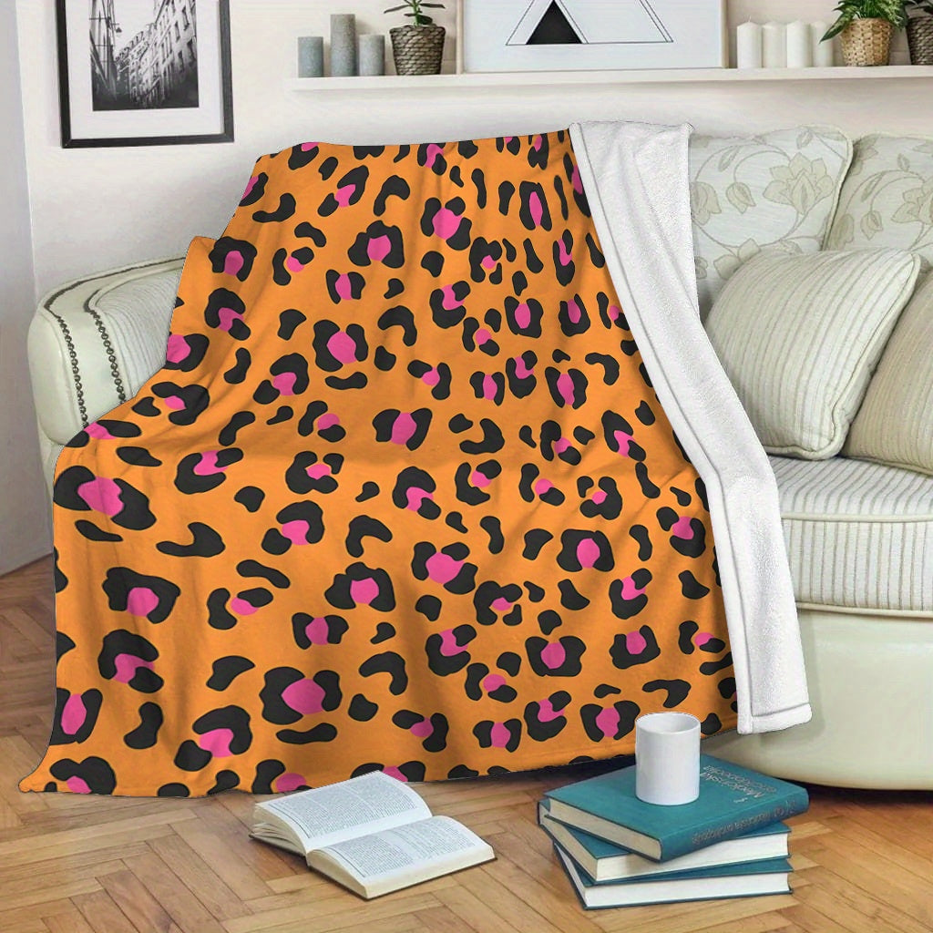 Soft and cozy flannel fleece blanket with a contemporary design. Suitable for all seasons, this blanket is machine washable and features a digital print orange leopard pattern. Made with a polyester cover, this warm plush blanket weighs 200-250gsm and is