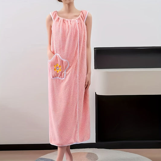 Luxurious coral fleece women's bath towel dress, extra long, ultra-absorbent, sleeveless with floral pocket. Perfect for home use in blue or green.