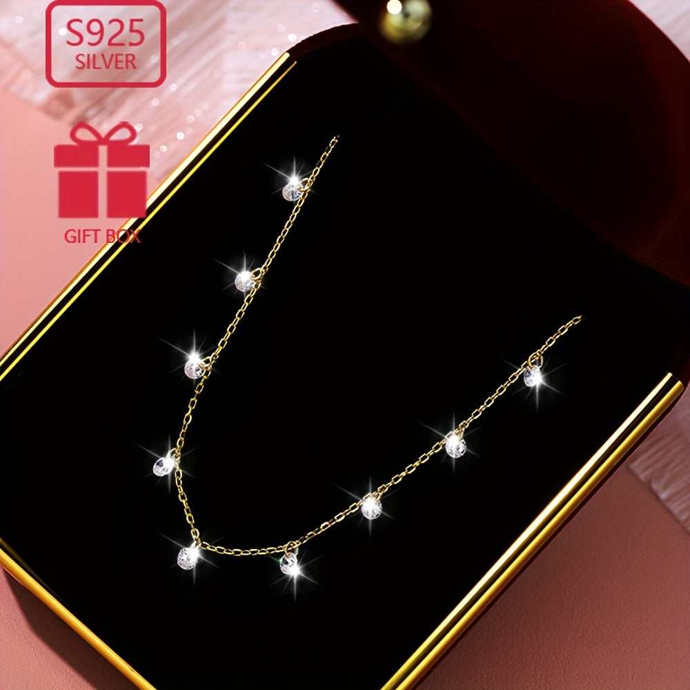 This elegant collarbone chain designed for women is crafted from 925 silver with stunning zirconia inlays. It shines beautifully and is perfect for both travel and everyday wear. Lightweight and low allergy, weighing approximately 1.7g.