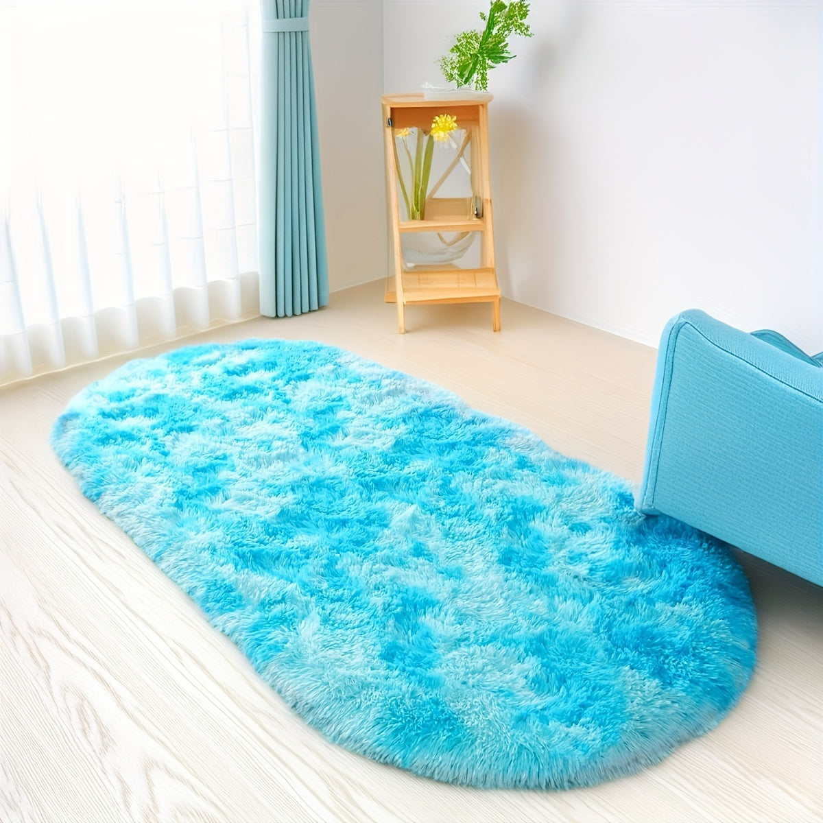 Soft and fluffy oval shaggy area rug, perfect for bedroom or living room. Made with skin-friendly thickened sponge and tufted polyester material. Durable and easy to maintain. Adds decorative touch to indoor spaces such as sofa, bedside, playroom, or