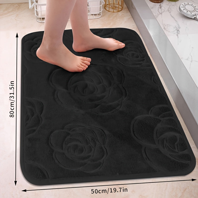 Soft and luxurious bath mat featuring a beautiful rose embossed design. This non-slip bathroom rug is made of ultra-soft knit polyester, providing superior comfort and absorbency. Lightweight and washable, this versatile mat is perfect for use in the