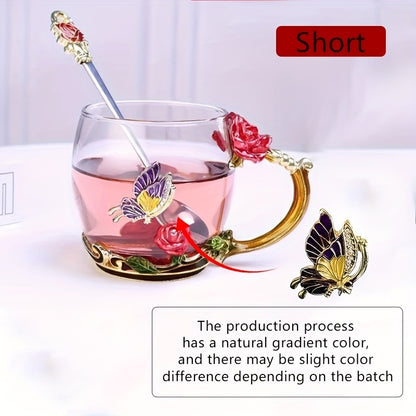 Rose enamel crystal tea cup with butterfly and rose design, includes spoon, clear glass.