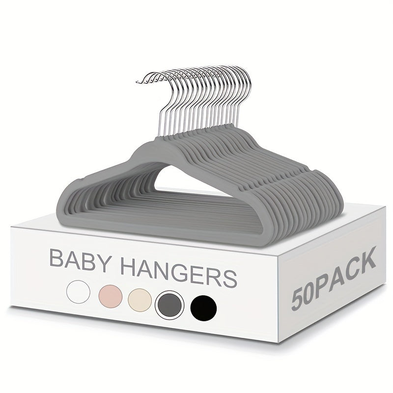 Get a 50 pack of cute and durable velvet baby hangers for your closet! These non-slip toddler hangers are the perfect size at 29.97 cm for your child's clothes. Perfect for newborns and children.