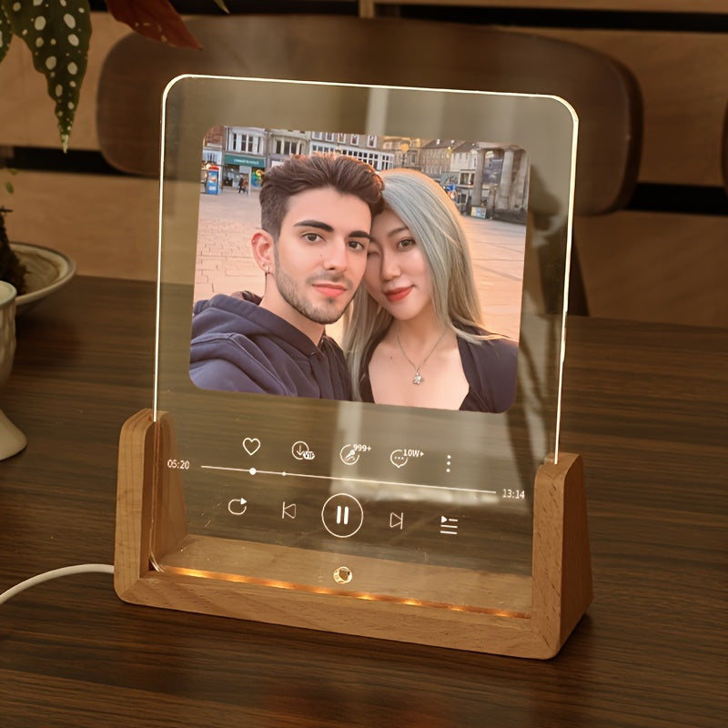 This personalized photo frame features a modern acrylic design with an LED love heart, creating a romantic atmosphere. It is USB powered and suitable for displaying a single picture on your desktop. This frame makes a creative and thoughtful birthday