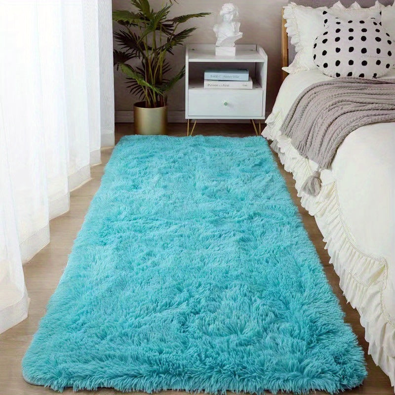 Soft, fluffy shag area rug perfect for living room or bedroom decor. This non-slip machine washable carpet adds luxury and coziness to any space.