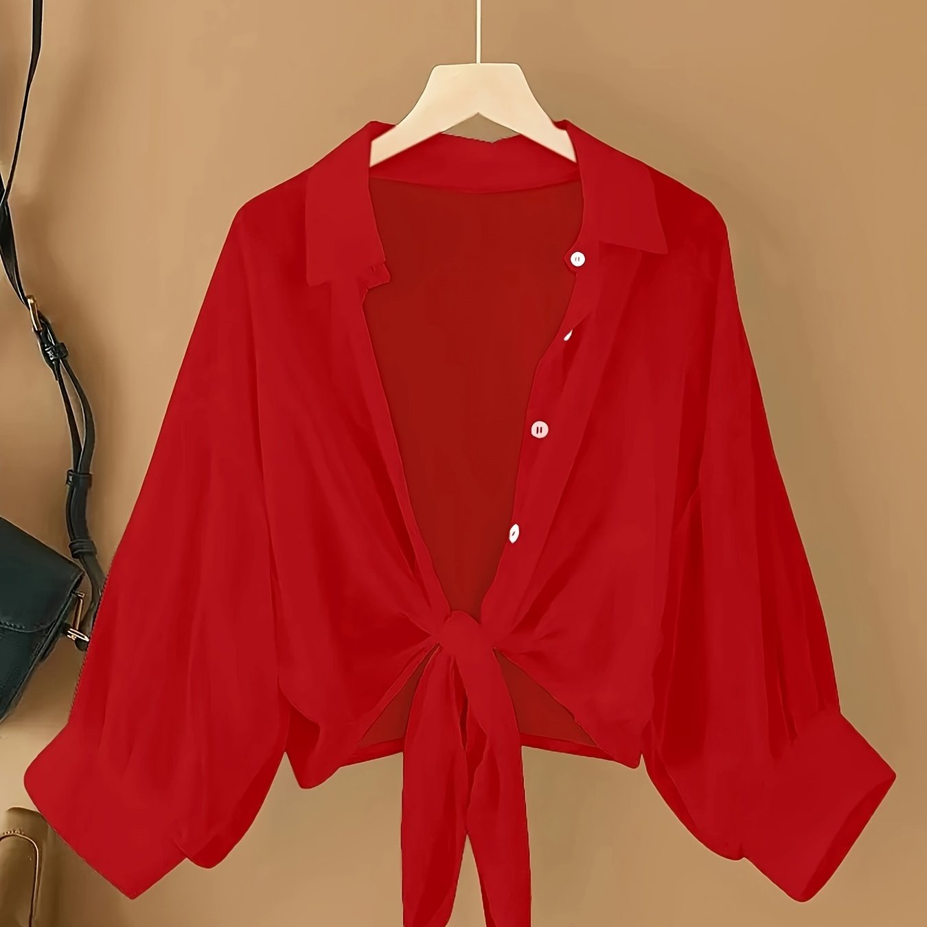 Women's casual chiffon cardigan with front bow detail and lapel collar, suitable for spring/summer/fall.