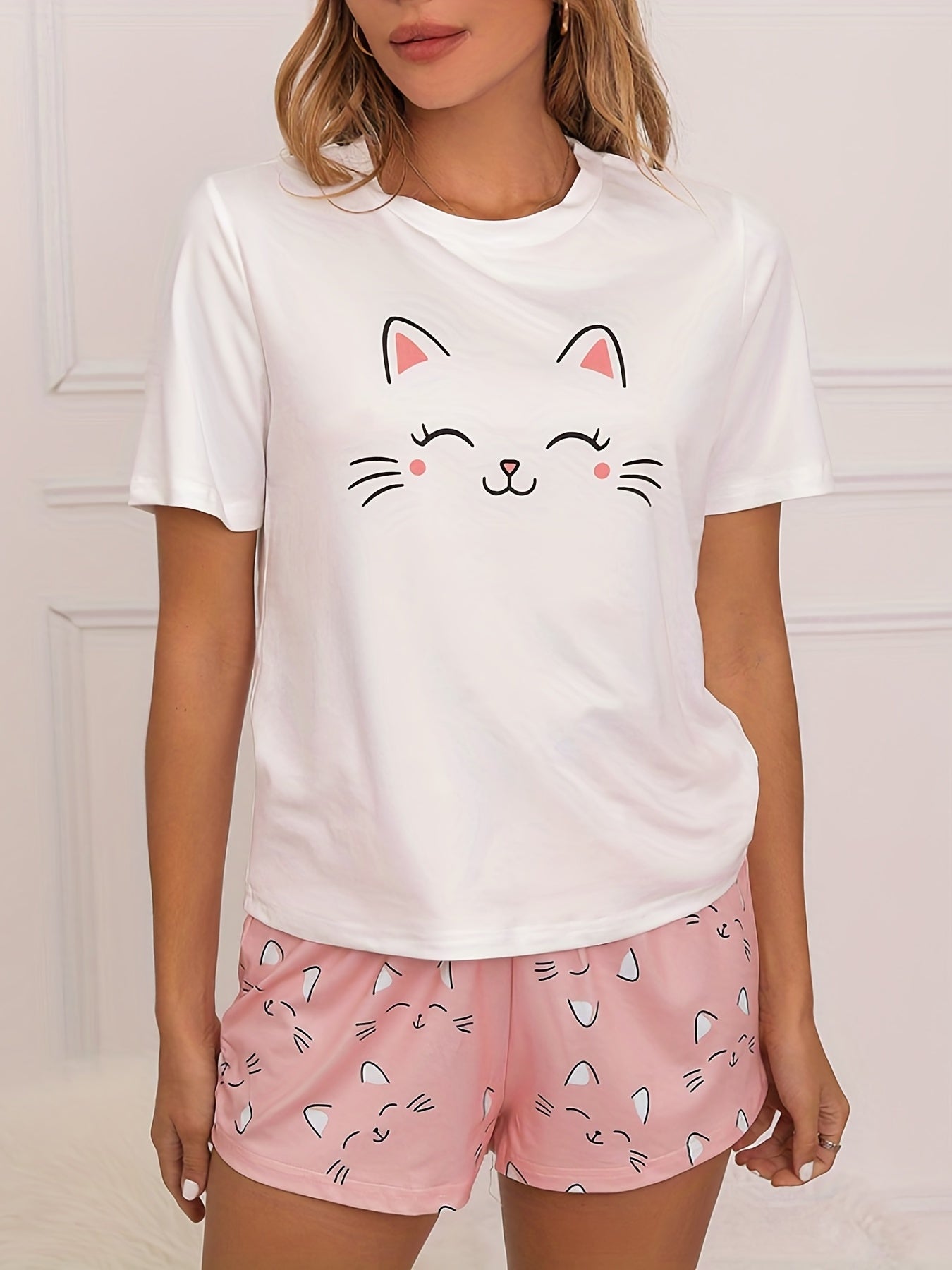 Women's Cartoon Cat Print Lounge Set with Short Sleeve Crew Neck Top and Lace Up Shorts for Loungewear and Sleepwear.