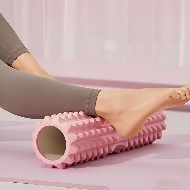 Compact and durable mini foam roller with EVA massage bumps for deep tissue relief. Ideal for yoga, Pilates, and gym workouts. Available in pink, purple, and blue.