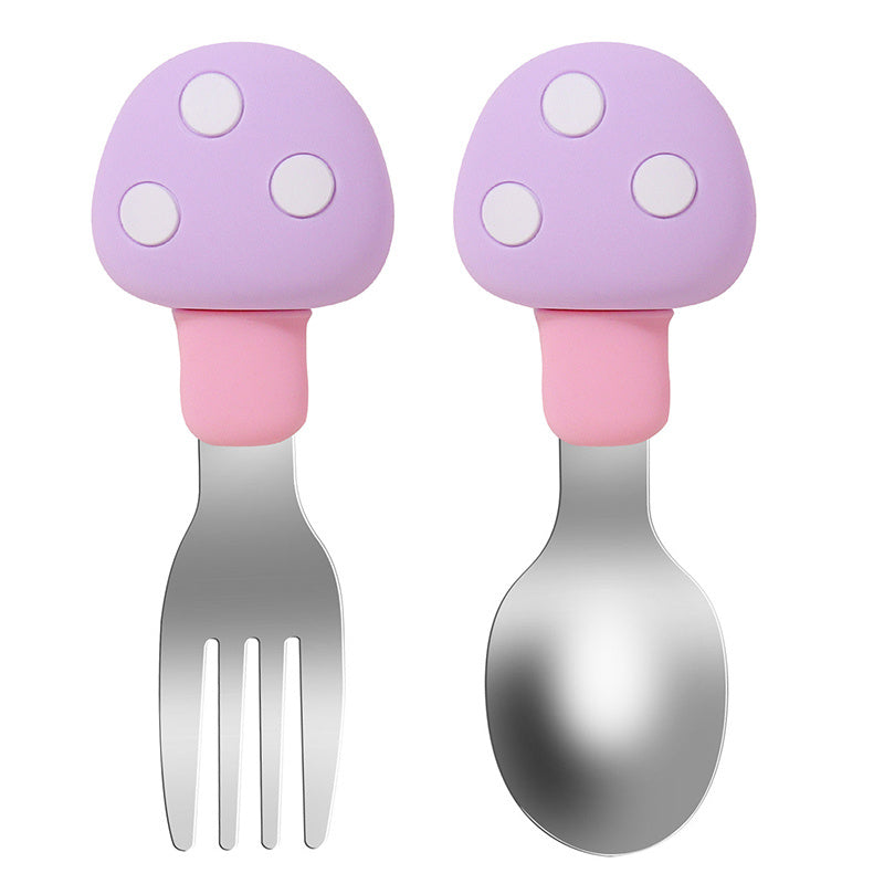 Set of feeding utensils for babies made of silicone and featuring a mushroom design. Includes a spoon and fork.