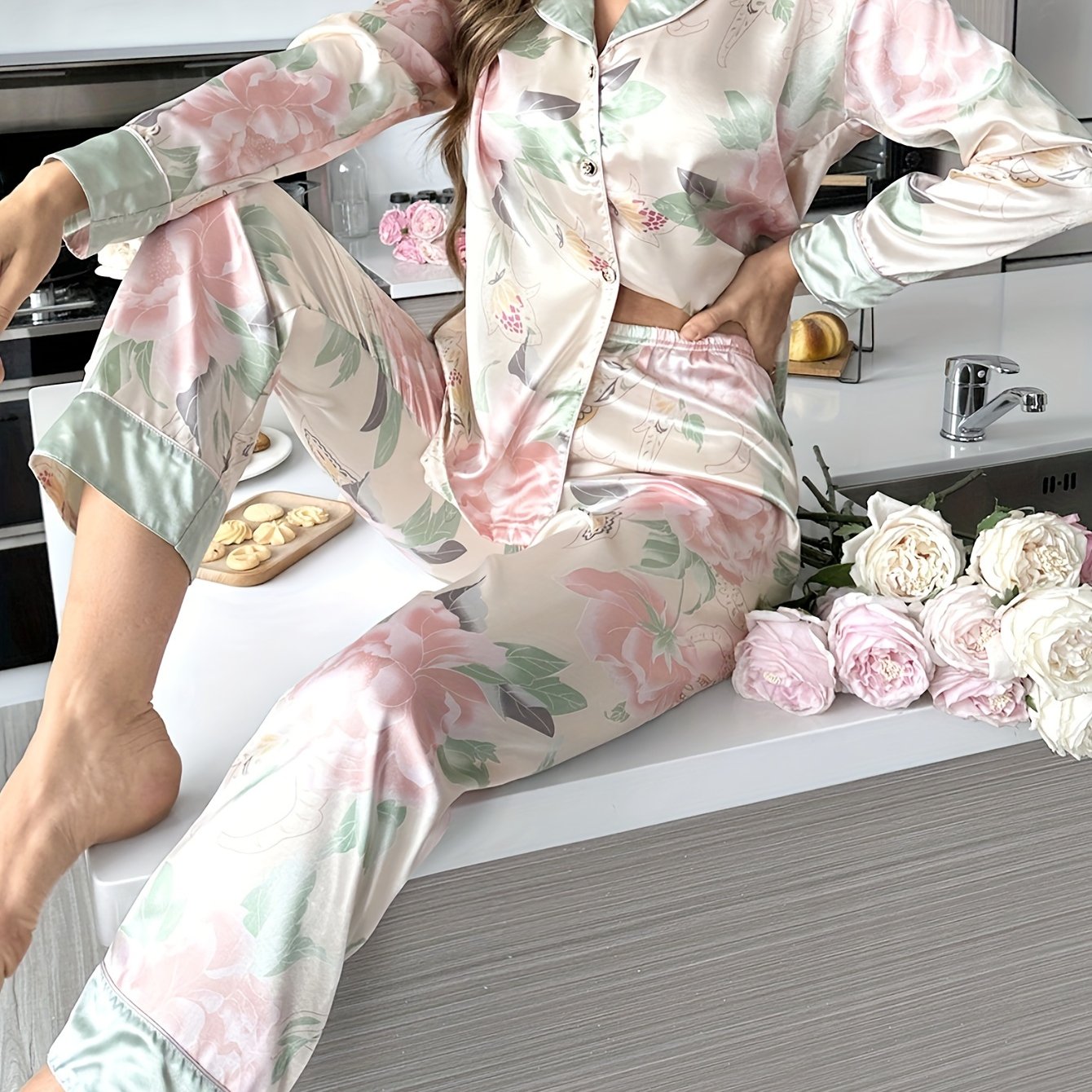 Women's soft satin pajama set with elegant floral print, long sleeve top and pants, perfect for indoor and outdoor wear.