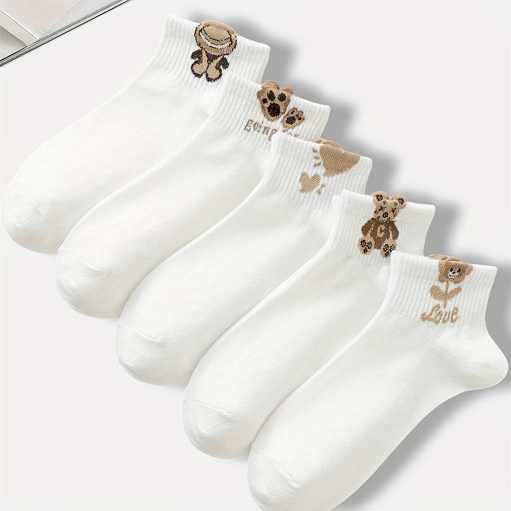 5 pairs of cute and soft white cartoon print short socks for women, made of breathable material.