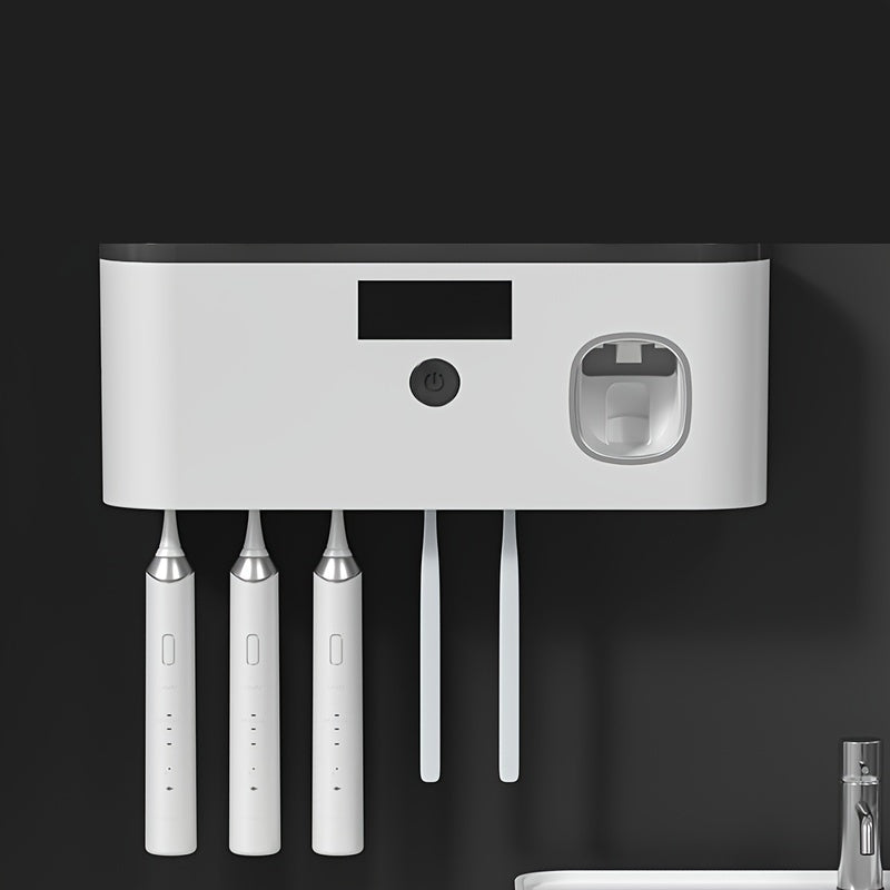 UV Toothbrush with wall-mounted holder that kills 99% of bacteria. No drilling required, includes automatic toothpaste dispenser and can be charged using solar or DC5V.