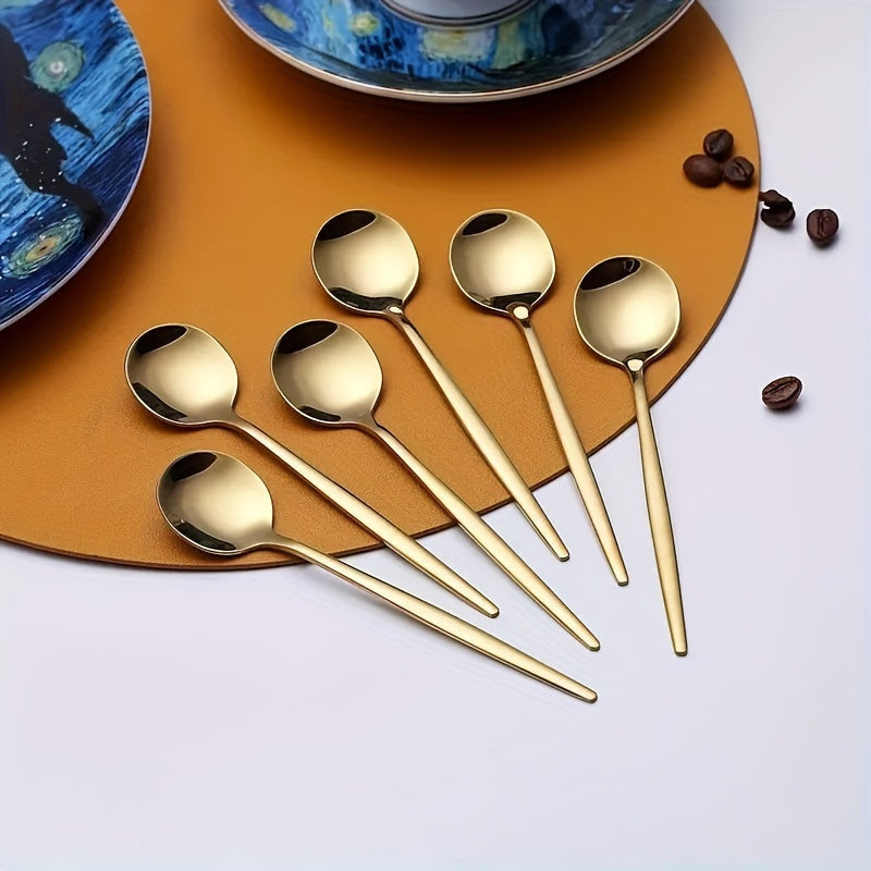 Get a set of 6/12 Gold-Tone Stainless Steel Dessert Spoons, ideal for use with coffee, tea, and other beverages. They are dishwasher safe, making them convenient for use in both home kitchens and restaurants. Perfect for special occasions such as