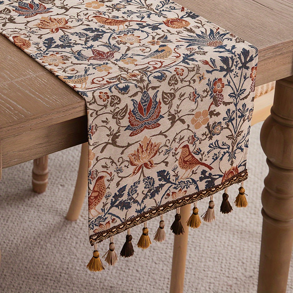 Vintage floral and bird jacquard table runner with tassels in rustic countryside style. Made of polyester, 33cm wide. Ideal for dining, coffee, and tea tables. Vintage design with polyester fabric.